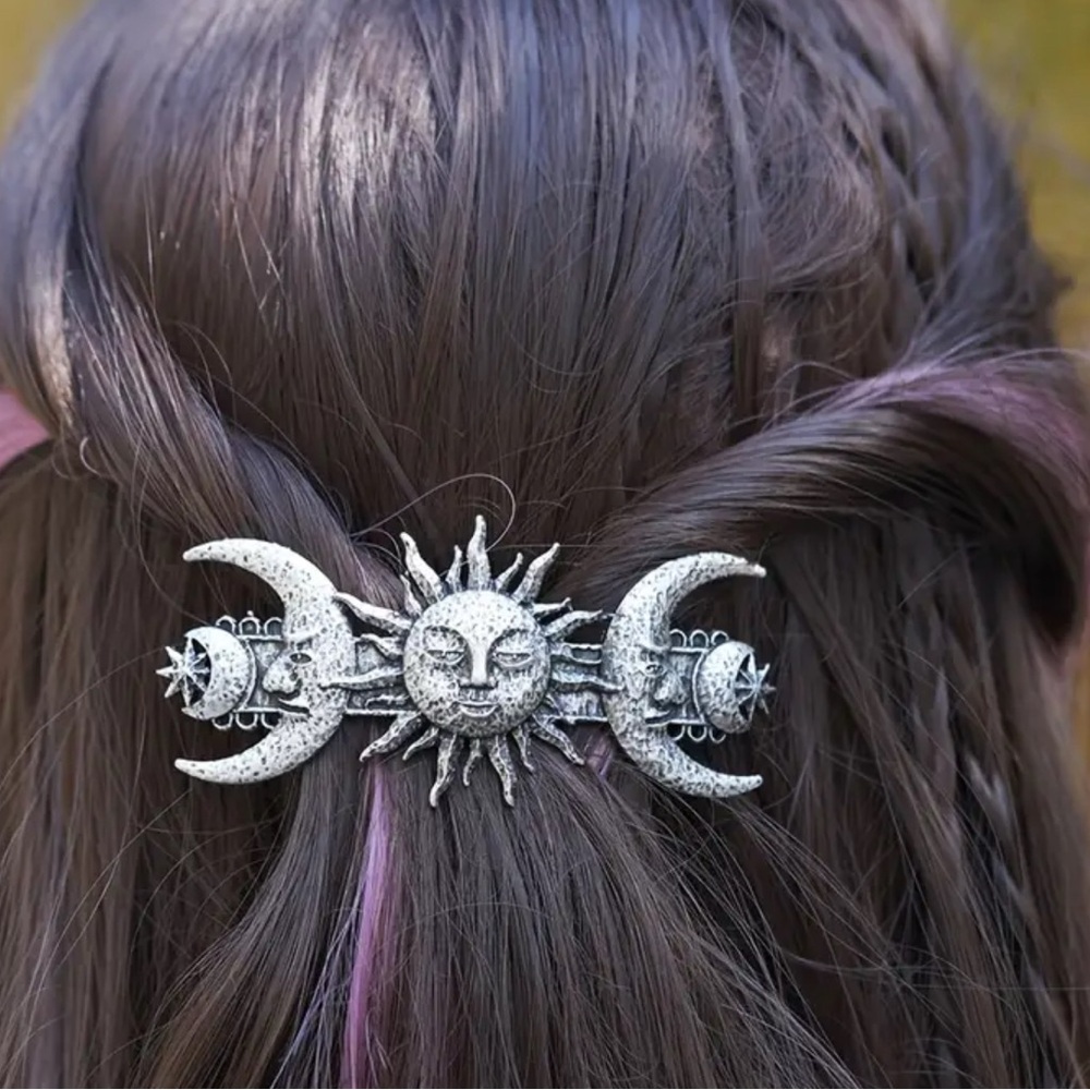 (4 pieces total)
Eagle  hair clips (2) and (2) sun, moon hair  clips